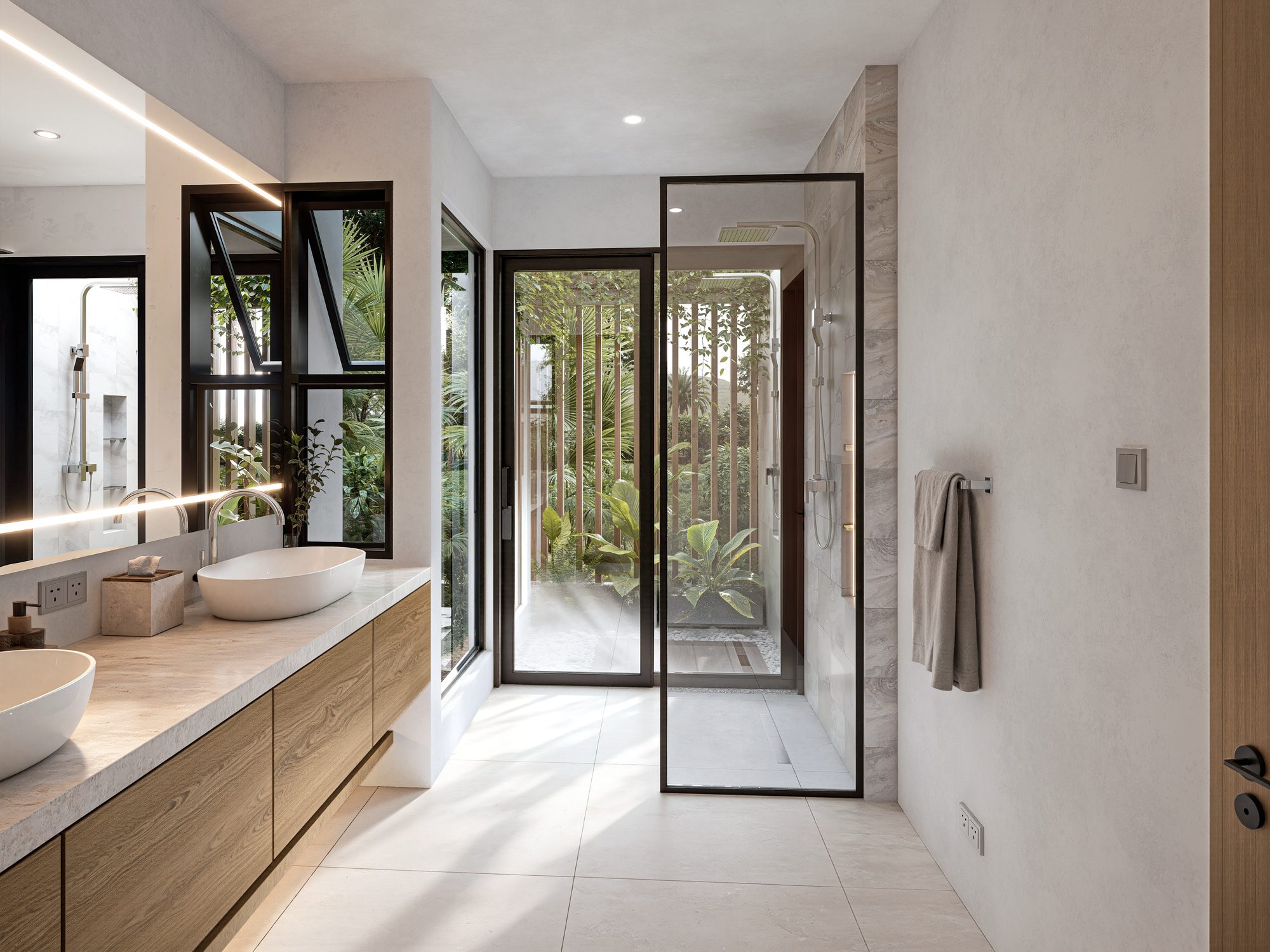 Bathroom opening to a planted courtyard
